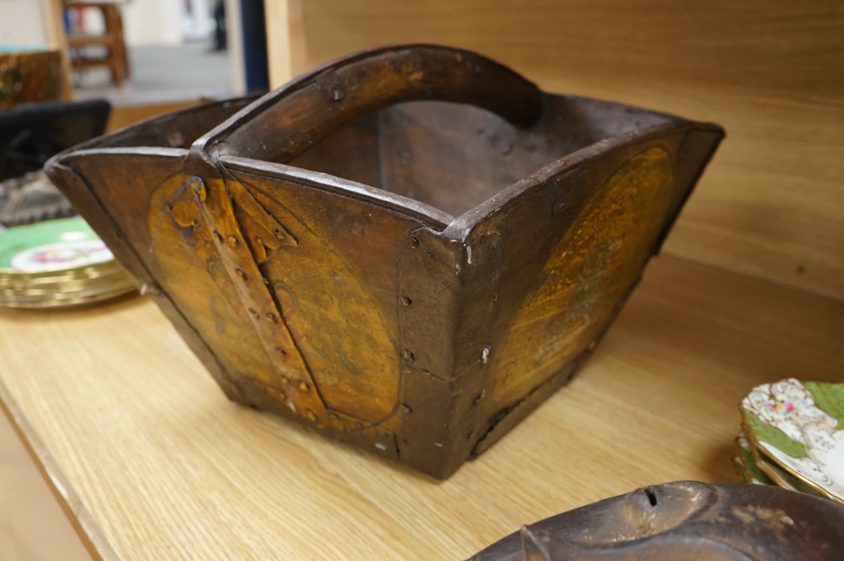 A 19th century Chinese hardwood painted rice carrier, 39cm square, 33cm high.